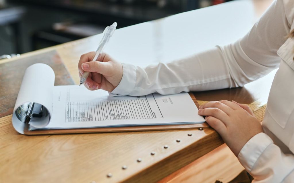 Women reading over a painters contract.