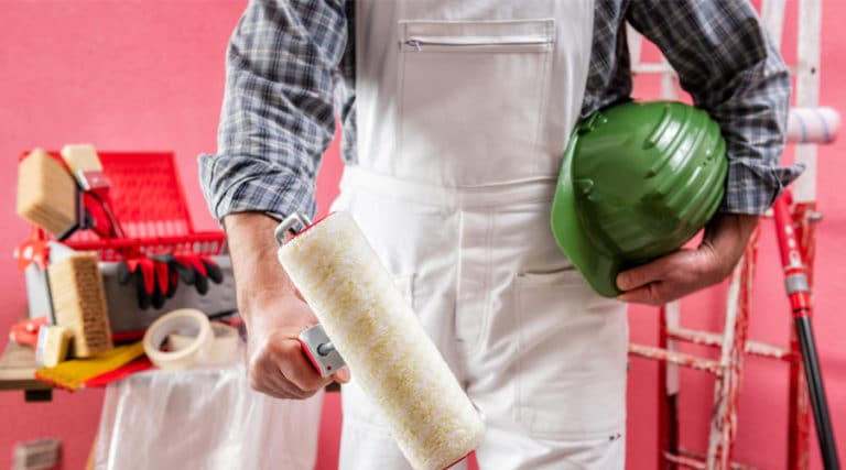 Painter with supplies ready to paint