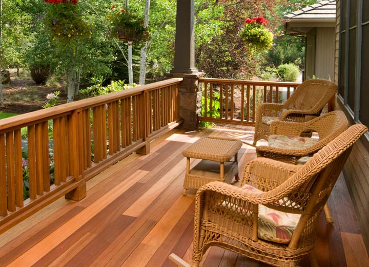 Stained wooden deck in home backyard